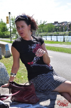 Brunette babe smoking at the park