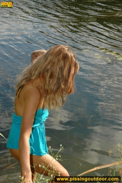 Pissing in the lake in a summer day - N