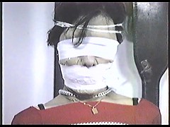 poletied-and-tightly-tape-gagged