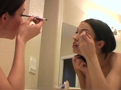 putting-on-her-makeup