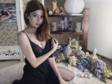 Busty teen redhead shows off on a webcam