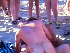 Voyeur Guy wanking and fuck redhead girl on a public beach