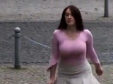 Busty girl walking, no bra, jiggling