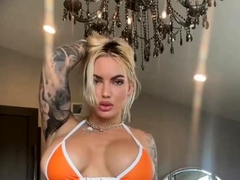 blonde-babe-shows-her-big-boobs-in-public