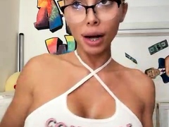 MILF with Big Boobs enjoying herself on cam